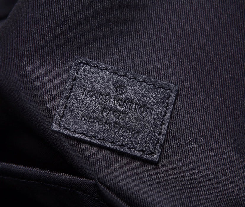 Signature Shadow Monogram Backpack