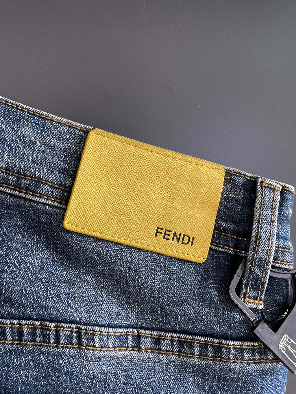 Fend Denim Jeans with Vintage Wash and Embroidered Details