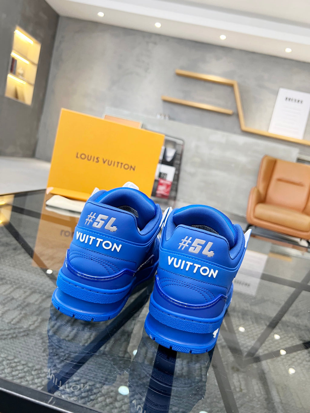 Vibrant Blue Luxury Sneakers with High-End Detailing