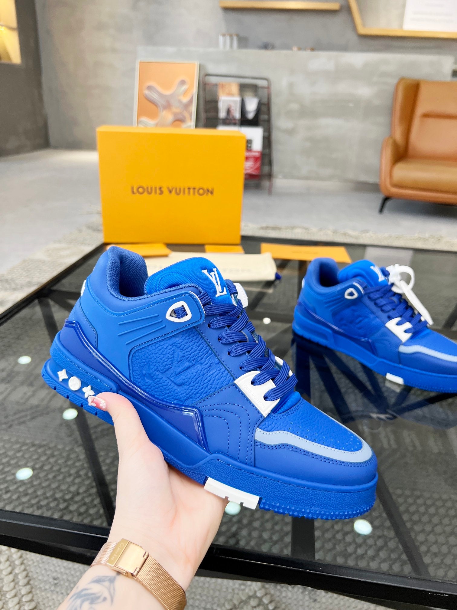 Vibrant Blue Luxury Sneakers with High-End Detailing