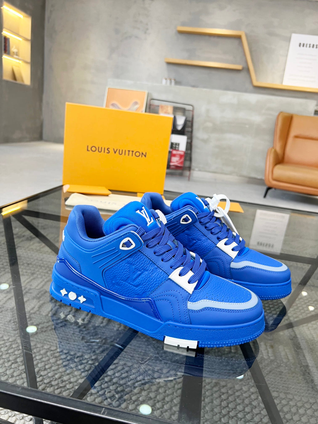 Vibrant Blue Luxury Sneakers with High-End Detailing