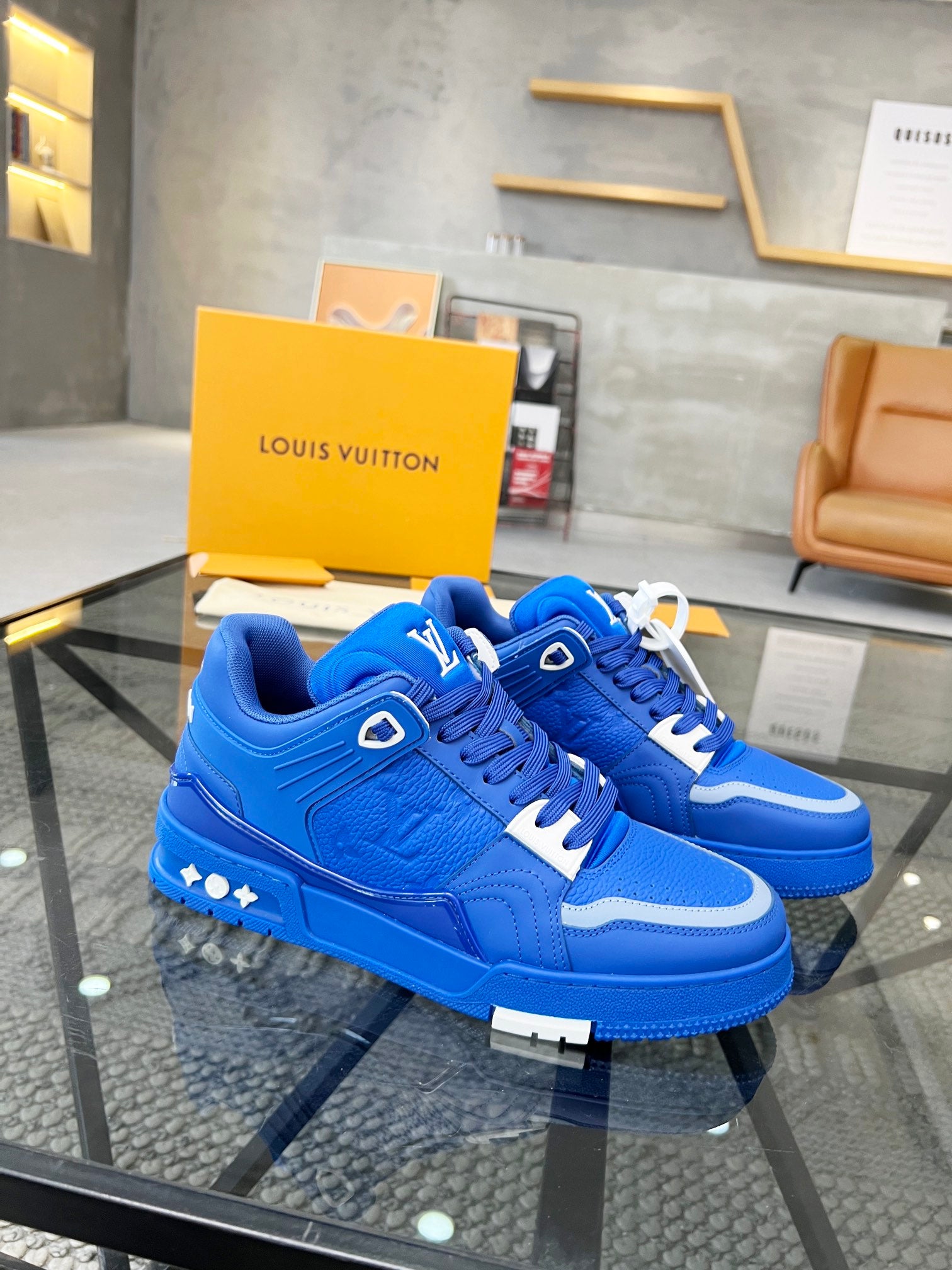 Vibrant Blue Luxury Sneakers with High-End Detailing