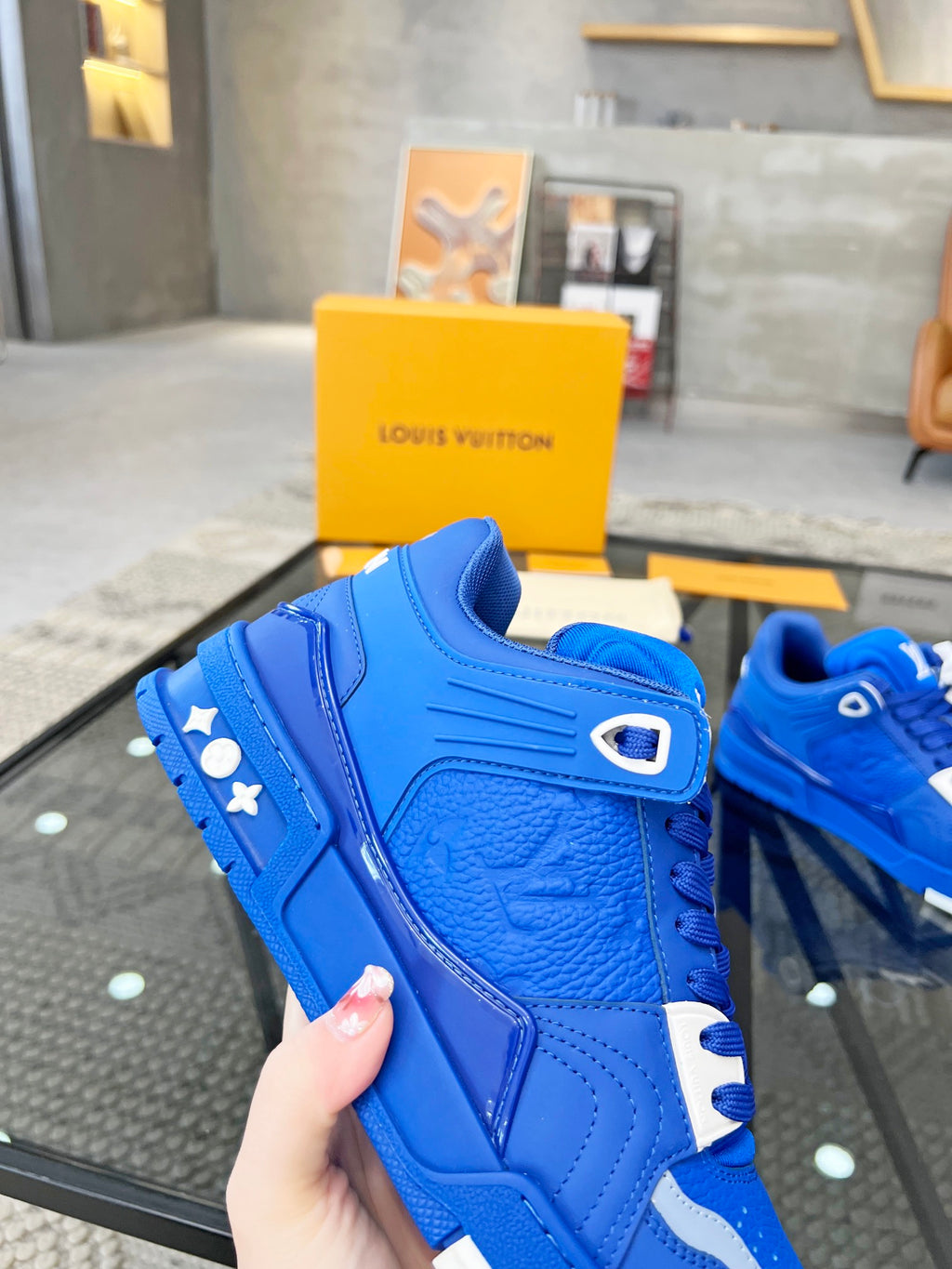 Vibrant Blue Luxury Sneakers with High-End Detailing