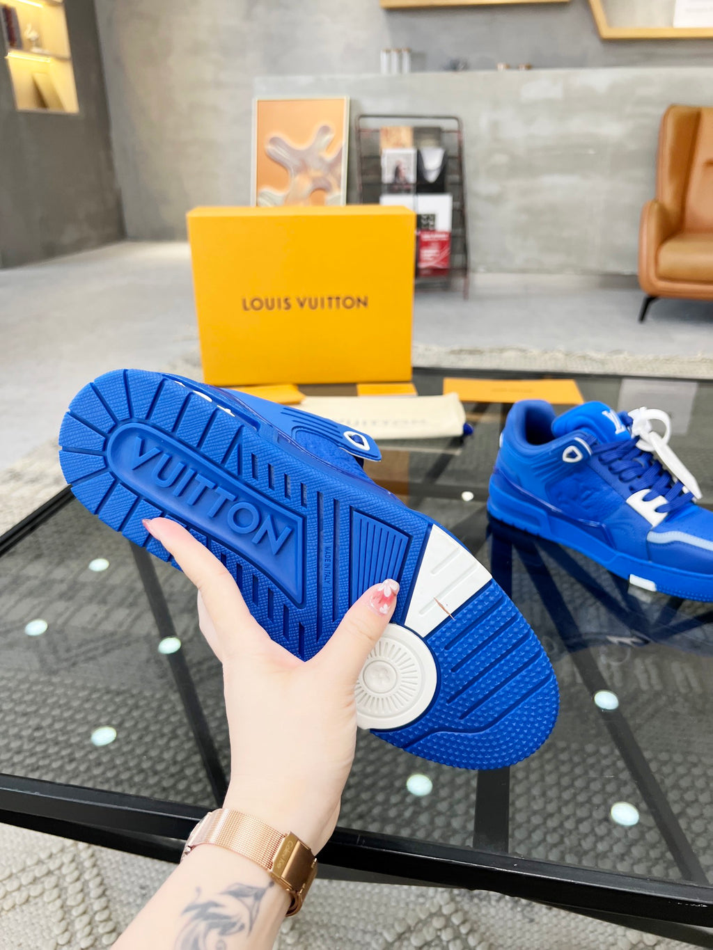 Vibrant Blue Luxury Sneakers with High-End Detailing