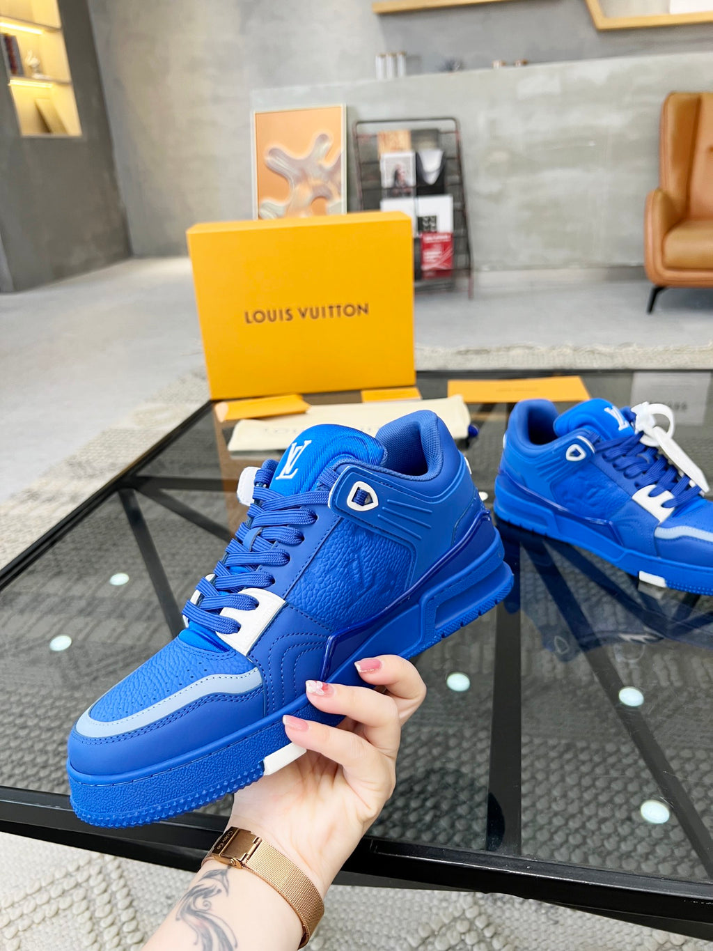 Vibrant Blue Luxury Sneakers with High-End Detailing