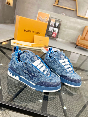 Distressed Denim Luxury Sneakers with High-End Detailing and Signature Blue Sole